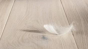 Byggmax golv upphov till konflikt med två husägare