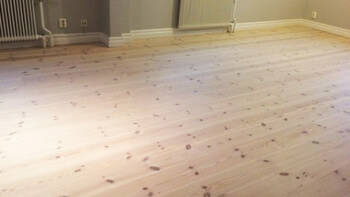 Golv slipades flammigt - får rätt i ARN