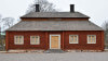 Bild på ett hus med ett säteritak.
