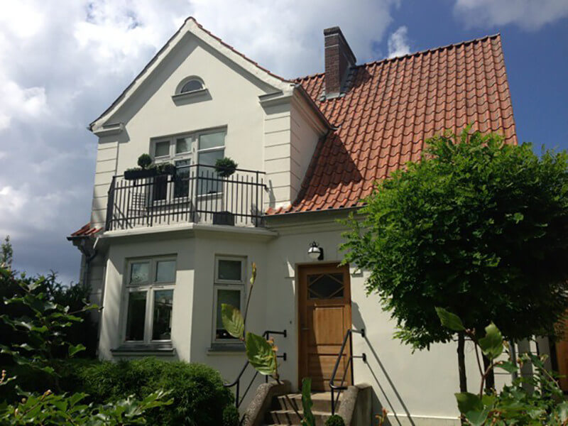 Hus målat med silikatfärg