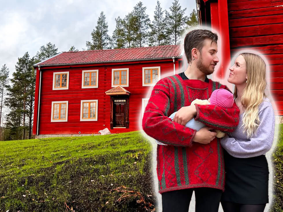 Familjen Hans-Ers vid den återuppförda timmerstommen.