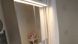 Finns det en fackmannamässig höjd på ett spegelskåp?